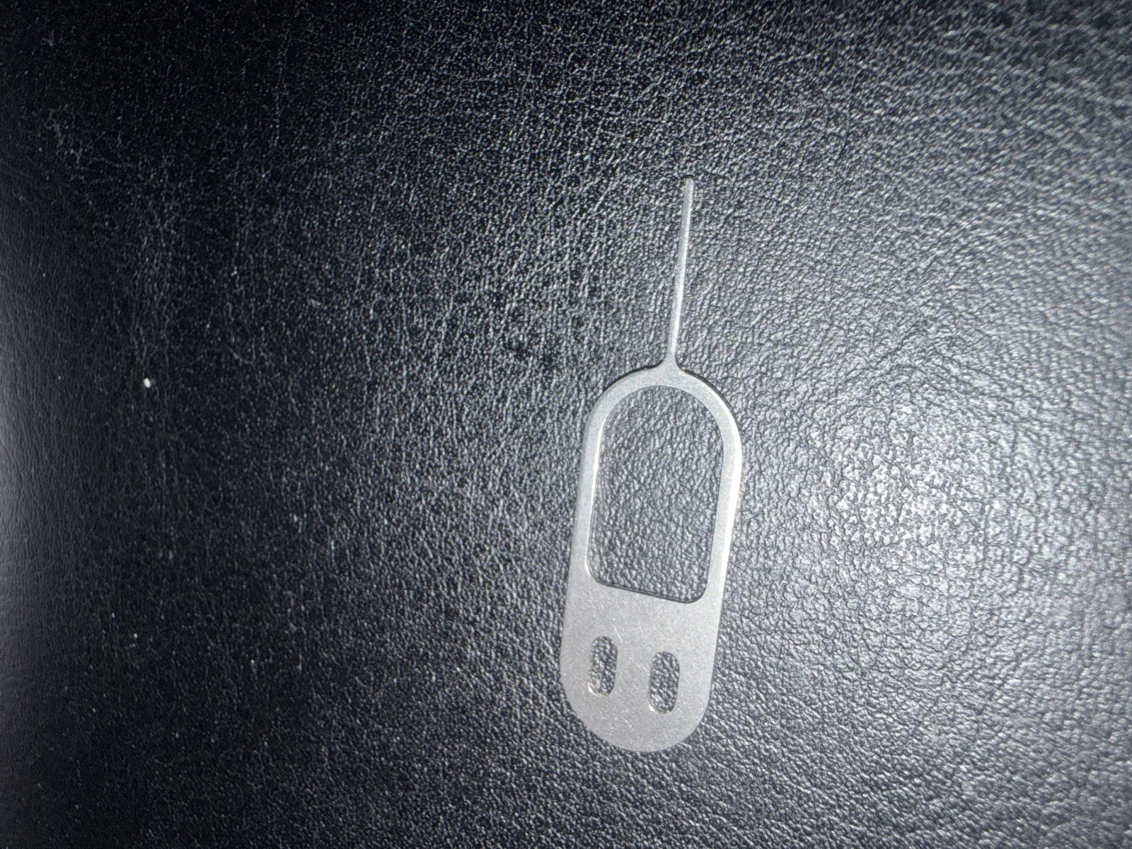 Sim changing tool