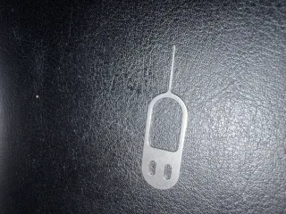 Sim changing tool